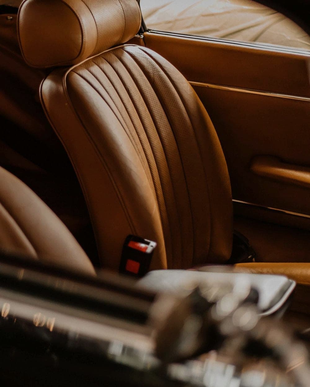 Tan leather seat after a retrim